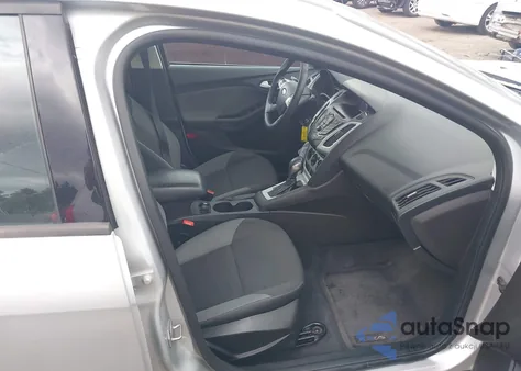 2014 Ford Focus Se z USA, uszkodzony, nr VIN 1FADP3F21EL105908